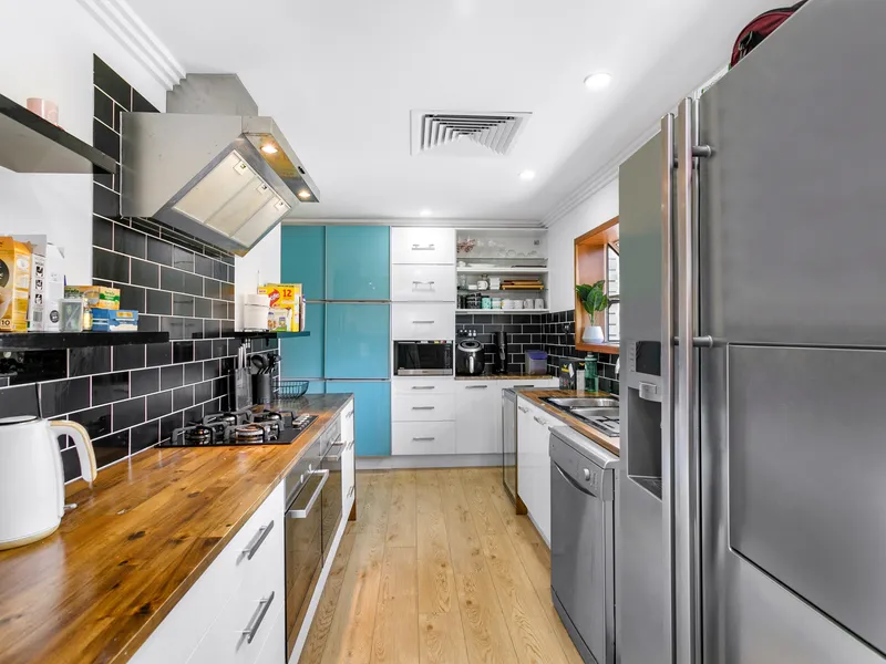 LARGE SPLIT LEVEL FAMILY HOME. NEW BUILD STYLING. TOTAL RENOVATION. POOL.