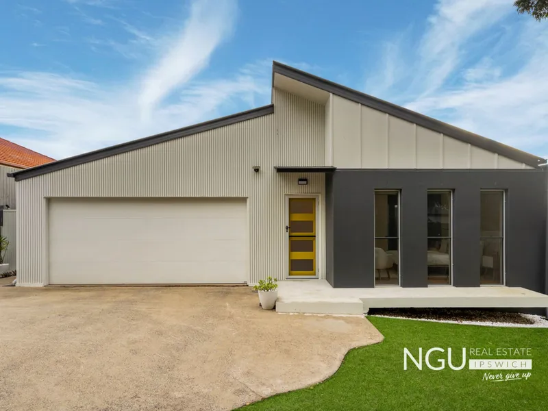 Renovated Architectural Masterpiece in Springfield Lakes