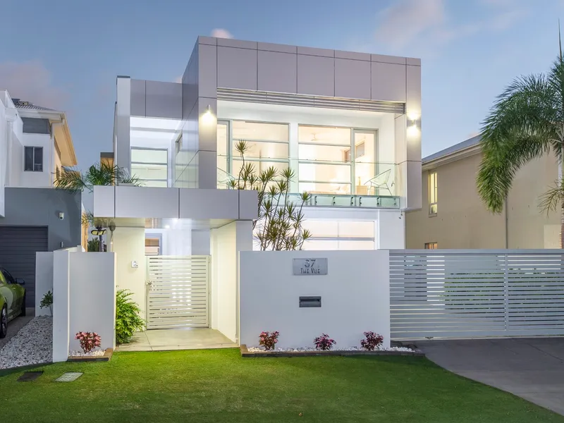 Luxury 6 bedroom designer home on water.