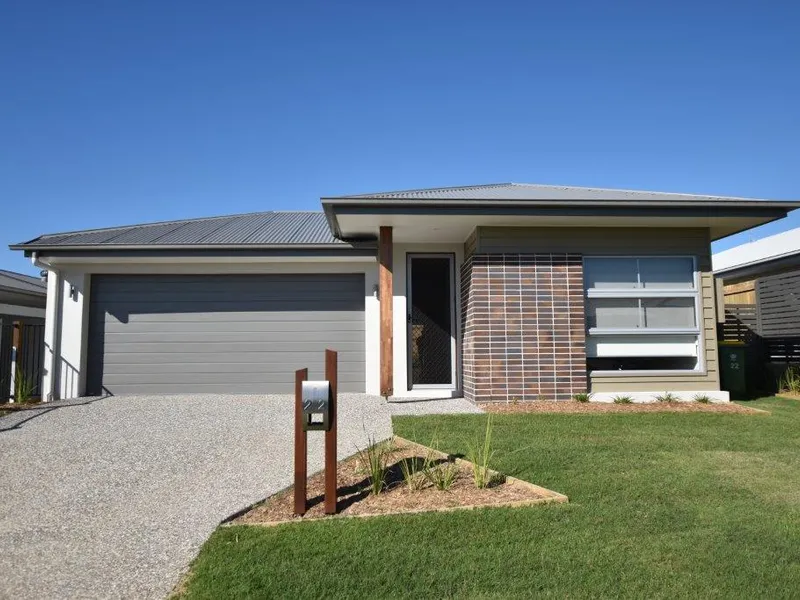 STUNNING FOUR BEDROOM REDLAND BAY HOME