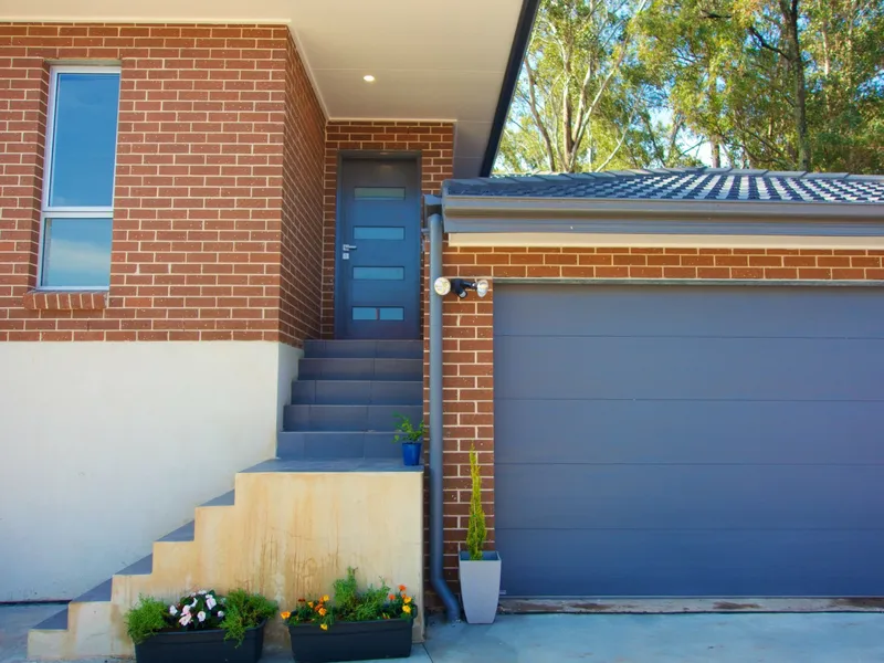 NEAR NEW FOUR BEDROOM BRICK FAMILY HOME