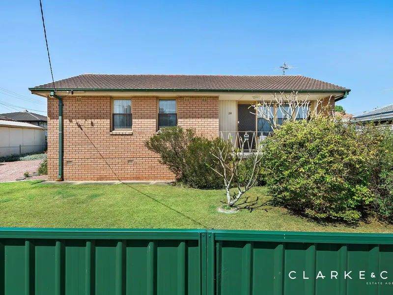 CHARMING BRICK HOME READY FOR A NEW CHAPTER!