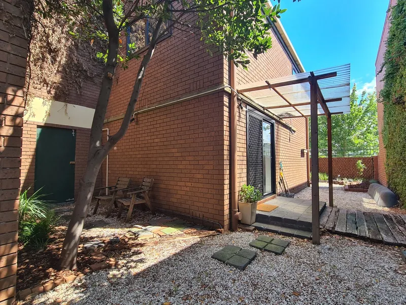 Tranquil 2-Bed Apartment with Private Garden Oasis in Carlton!