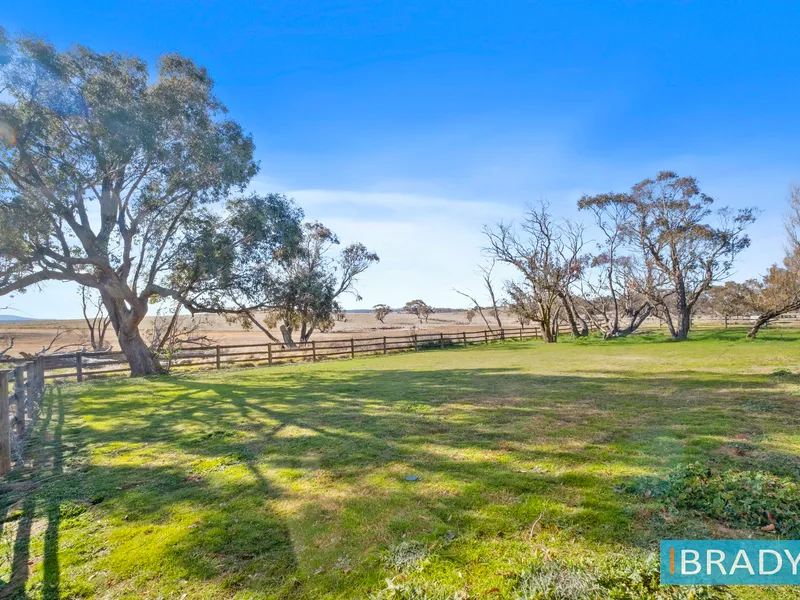 NEWLY PAINTED AND CARPETED, COUNTRY HOME WITH LOVELY RURAL VIEW