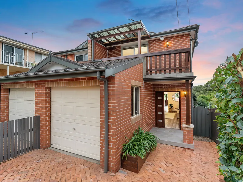 Renovated North Facing Duplex With Complete Convenience