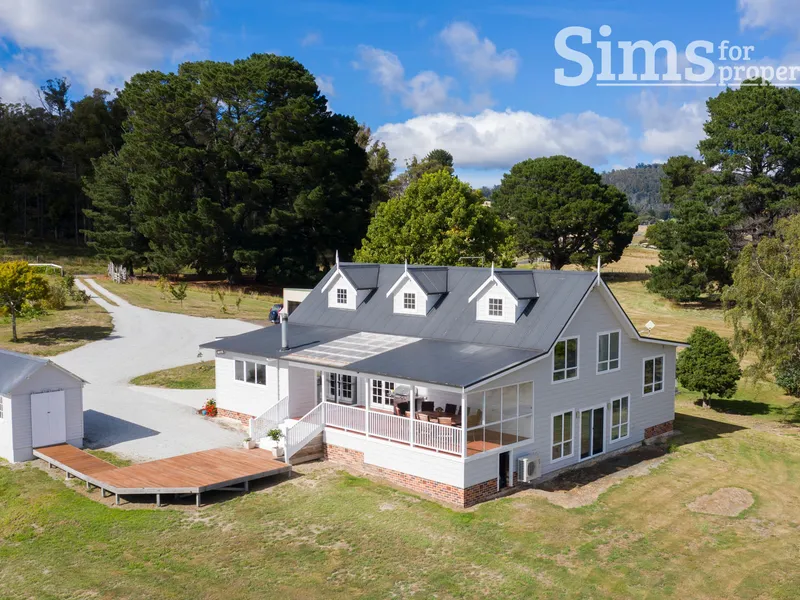 Remarkable rebuild on 51 acres of quality farming land