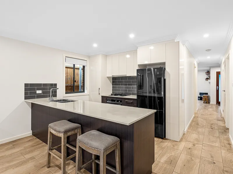 Near new, single level residence in a relaxed lifestyle setting