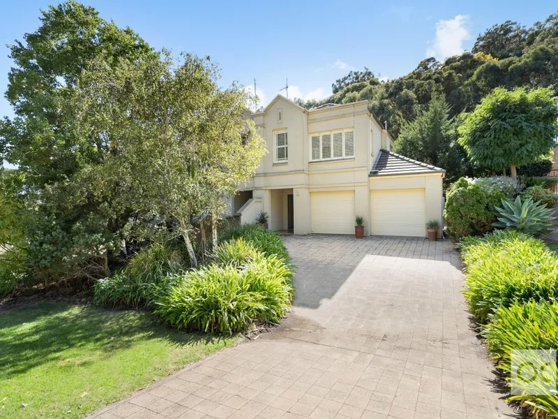 A Torrens two-storey home with a surprise rear outlook to savour