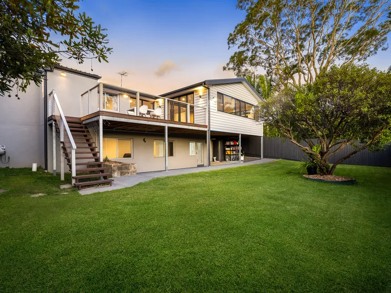 Contemporary Family Haven with Stunning Views in Warriewood Valley