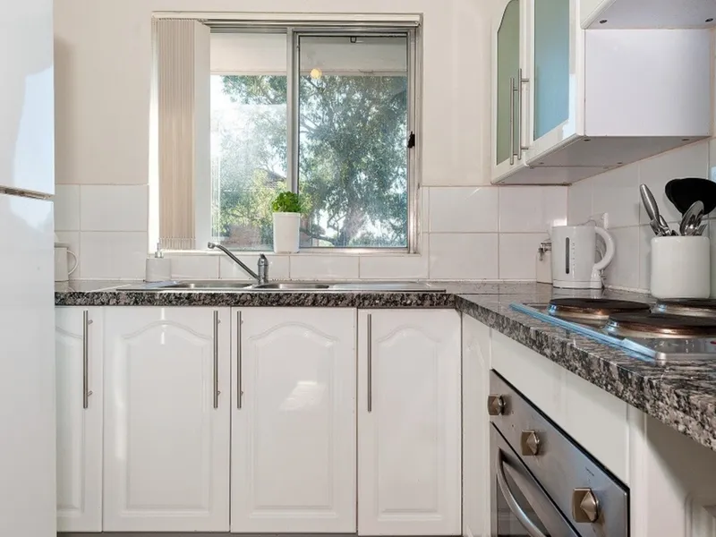 Located at the back of the block offering extra privacy, this two bedroom unit is bright & spacious with convenience at your door step!