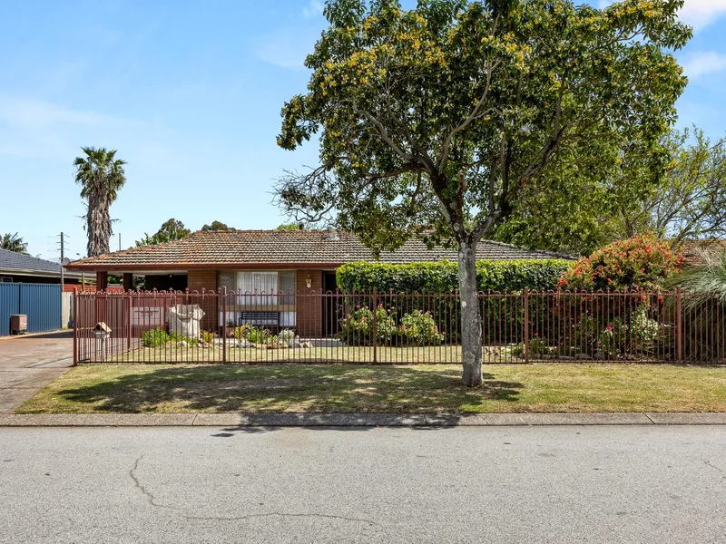Solid Brick Home with Side Access, Extensions & a Huge Patio!