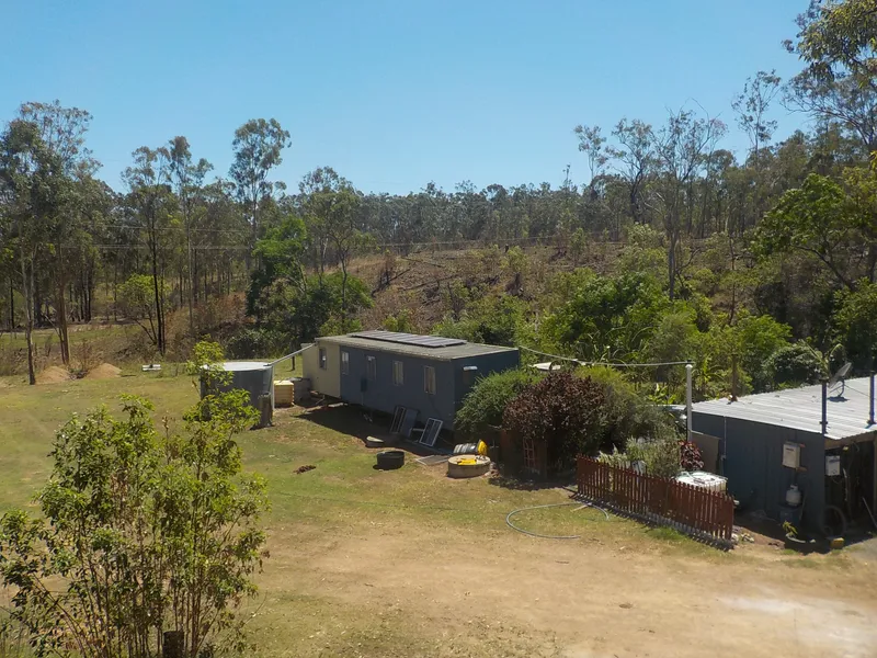 WEEKENDER CABINS TO GIVE YOU COMFORT WHILE BUILDING..OFF THE GRID SOLAR... WELL WATERED.