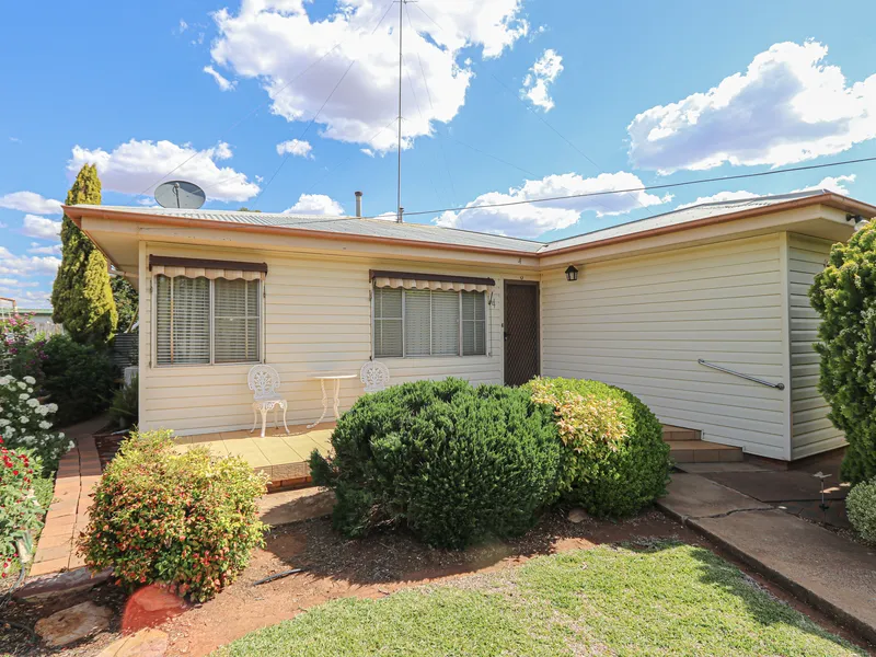 Well-maintained Home with Beautiful Gardens