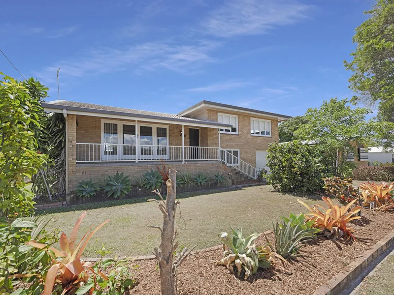FAMILY SIZED SPLIT LEVEL BRICK HOME