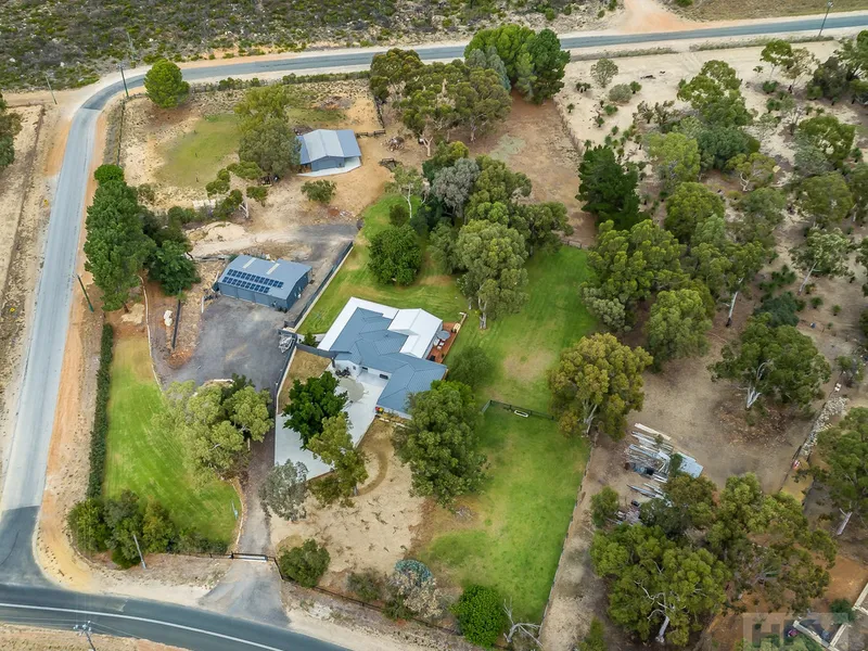 Stunning 3x2 home set on 3.6 acres with Extra’s Galore!