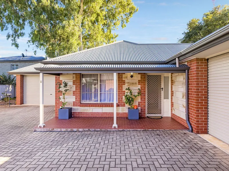 A perfect sandstone fronted courtyard home