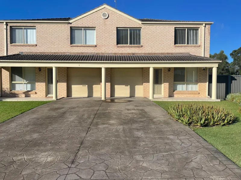 Very neat 3 bedroom townhouse,  with ensuite to master, air conditioning, garage.