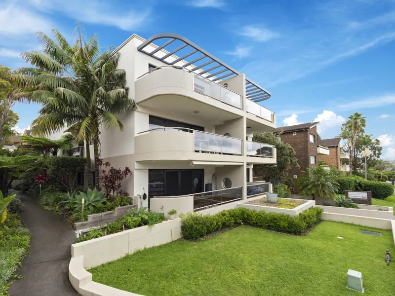 Elegant garden apartment offering a relaxed coastal lifestyle