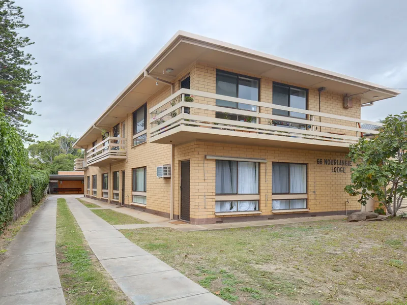 Light filled ground floor Unit, one street back from the beach!