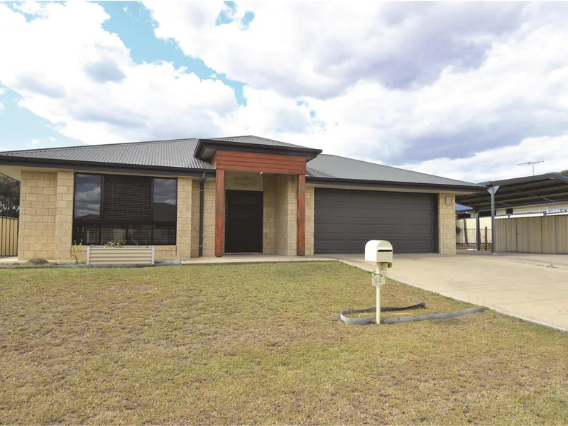 ELEGANT AND STYLISH BRICK HOME!