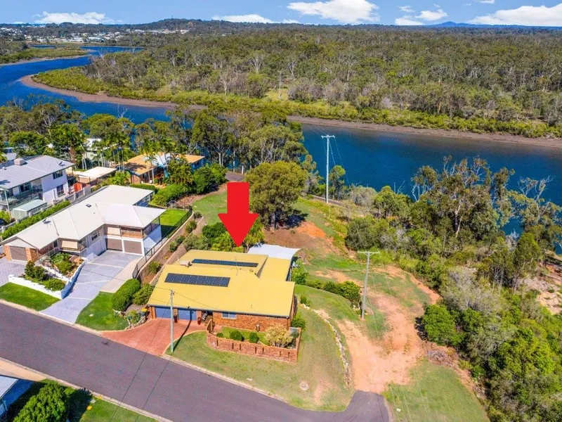 Iconic Home with Incredible Views Right on the River and Privately Positioned at the end of a Quiet Street