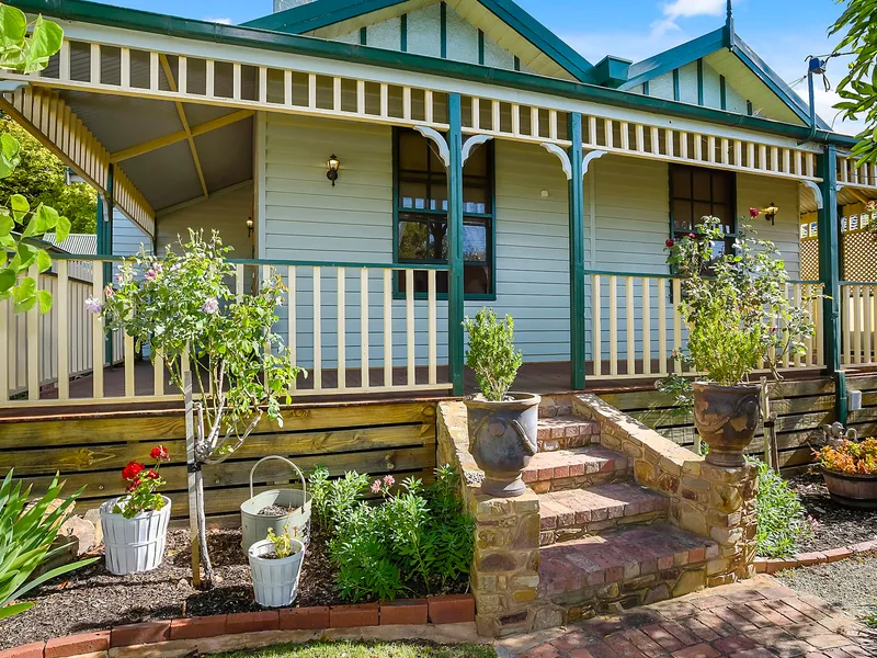 CHARMING CHARACTER FILLED FAMILY HOME.