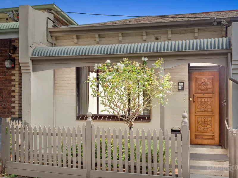 ELEVATED BRICK VICTORIAN IN PRIME LOCATION