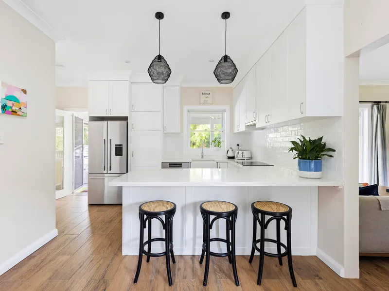 Single level home on a large corner block in blue ribbon locale