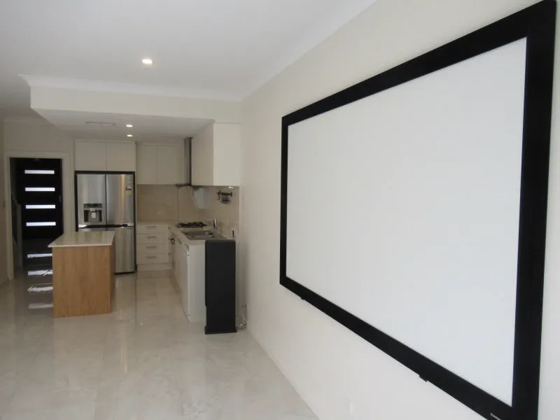 Quality 3-4 Bedroom Townhouse with Home Theatre Screen