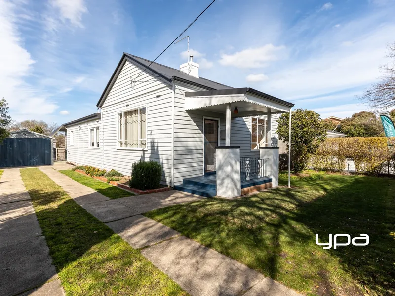 A Charming Cottage with Potential on A Large Block!