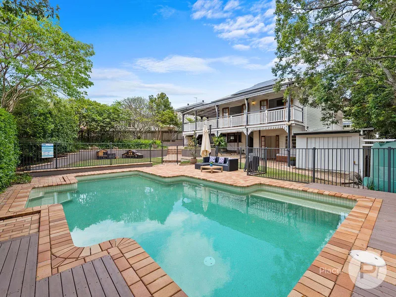 Elegant Queenslander on 842m2 with pool and dual-living potential