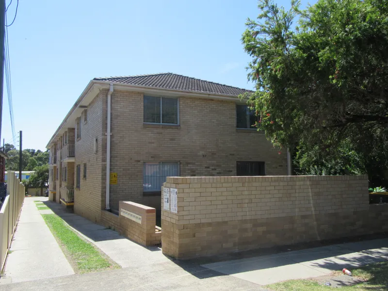 Well-Presented Unit with Timber Floors