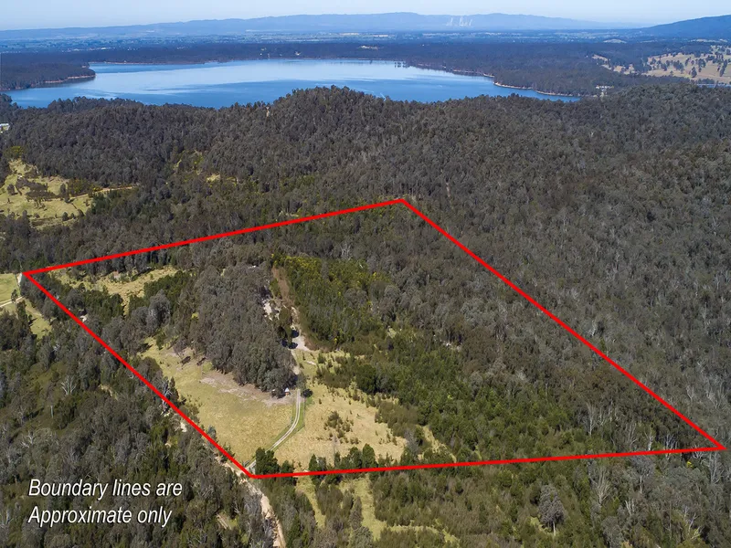 OFF-GRID HOME ON 52 ACRES WITH SPECTACULAR VIEWS