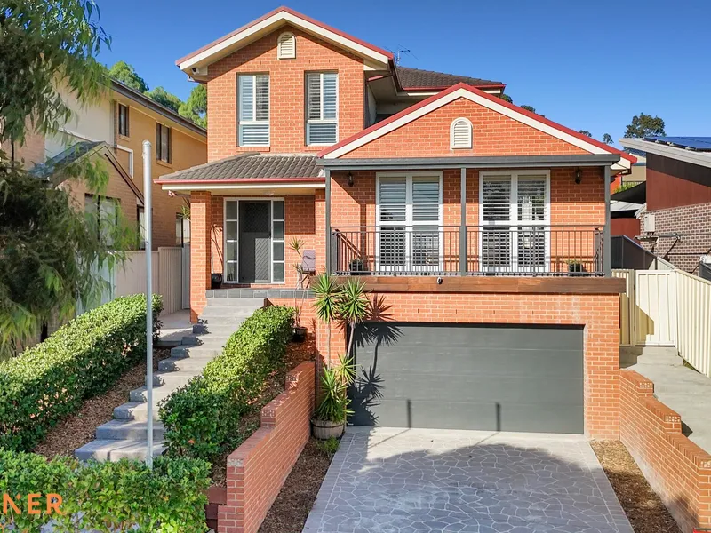 Hillside Heights: Elevate Your Lifestyle in this Multi-Level Retreat!