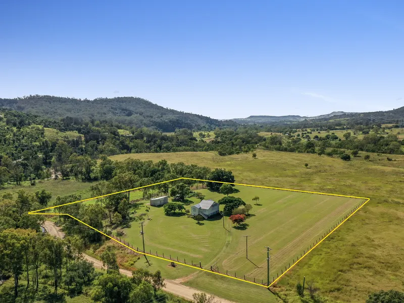Almost Five Acres of Prime Land with a History Filled Home