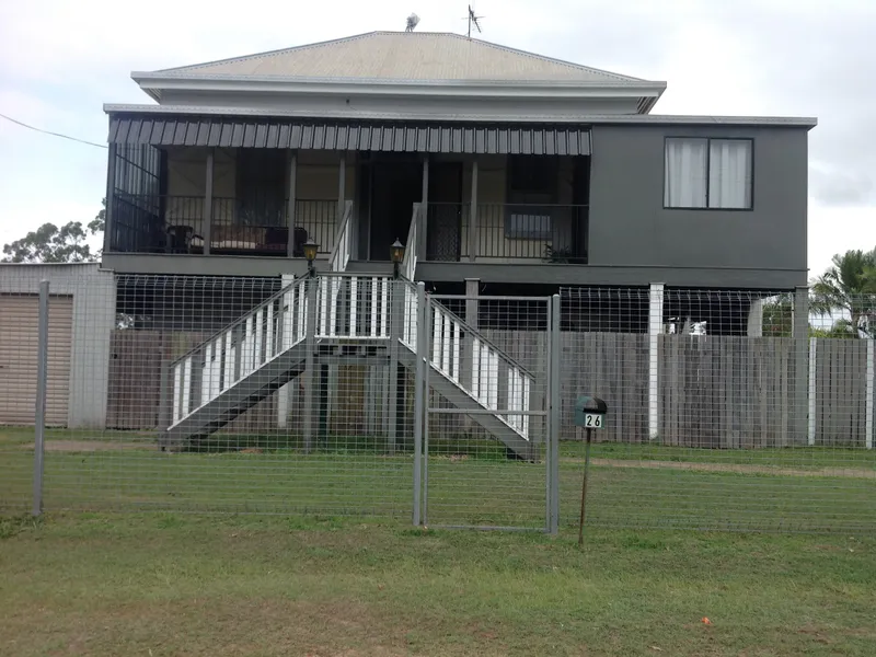 SPACIOUS 5 BEDROOM QUEENSLANDER WITH HIGH 12 FOOT CEILINGS