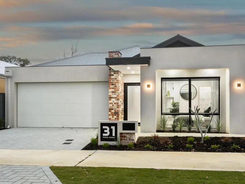 EXCEPTIONAL FORMER DISPLAY HOME OFFERING IMMACULATE FAMILY LIVING