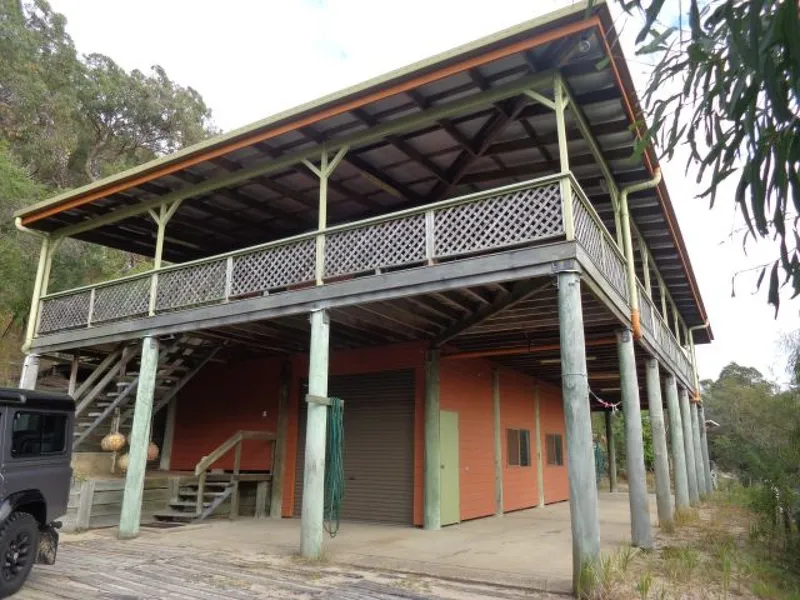 Situated at Orichid Beach on Fraser Island's top end is this magnificent elevated property known as 