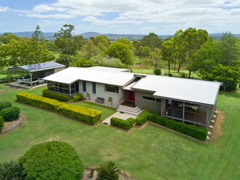 SOLD!!! PRIVACY AND PERFECTION ALL ROLLED INTO 1 ON JUST OVER 5 ACRES!