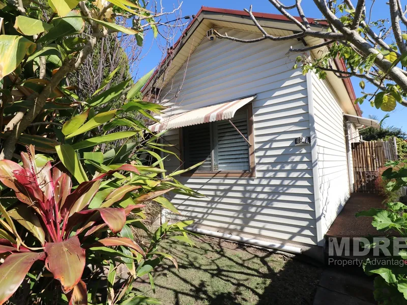 Bursting with charm and potential, a cute cottage on a big block.