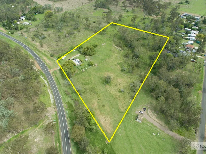 UNIQUE PROPERTY - TOWN WATER - 10 ac