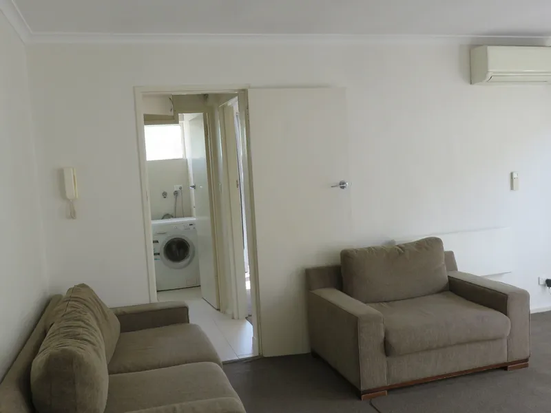 2 Bedroom, partly furnished apartment with balcony and parking in the heart of South Yarra