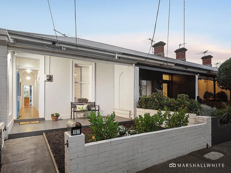 Sun-Drenched Easy Living with ROW and Garage Parking