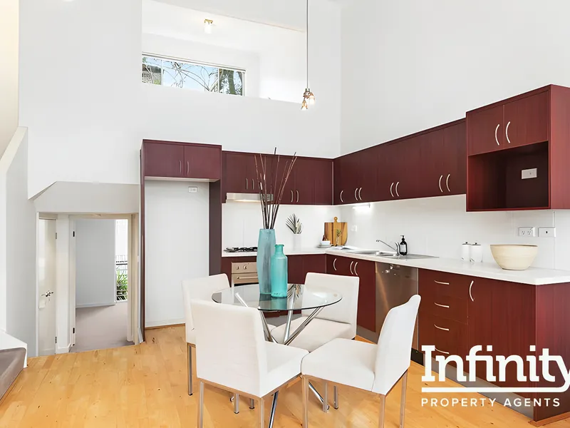 LOFT STYLE, SPLIT LEVEL TWO-BEDROOM APARTMENT