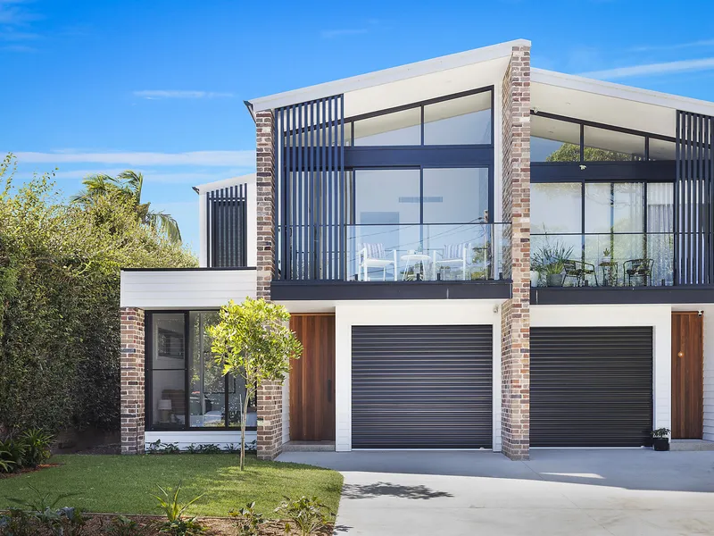 Modern, industrial-style duplex with luxury finishes.