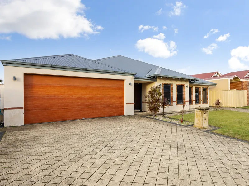 Immaculate 4-bedroom Home with High Ceilings and Home Theatre on Quiet Street