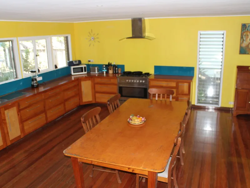 4 bedroom 2 Story House with large living areas, set into the hill with views and pool