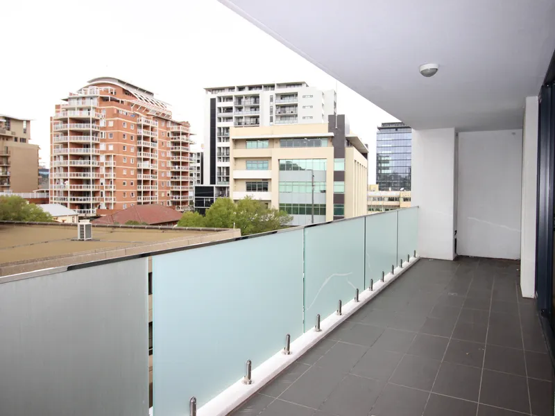 Mid Level Modern Apartment with Distant Northeastern View Close to Station