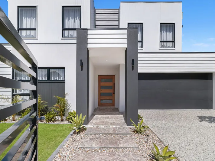 Opulent coastal living nestled minutes from the highly-sought after TSS Precinct.