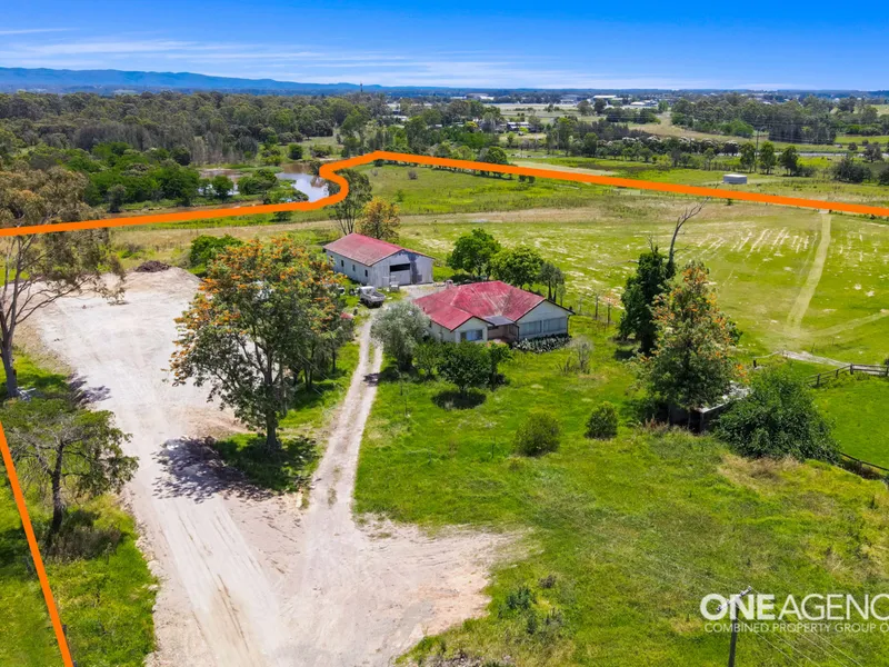 STUNNING ACREAGE - ENORMOUS POSSIBILITIES - ZONED IN2 !